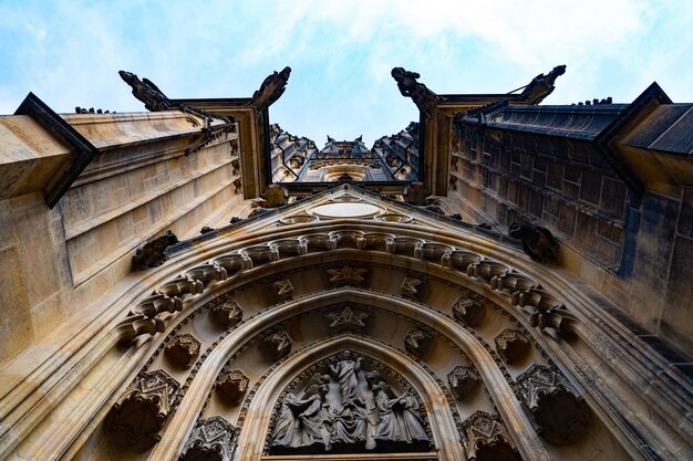 Low angle view of church entrance against sky