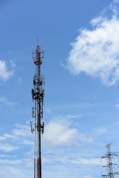 Low angle view of communications tower against sky