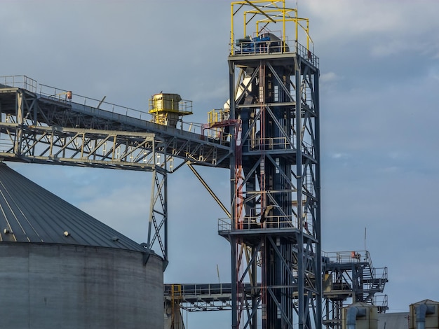 Low angle view of crane against sky