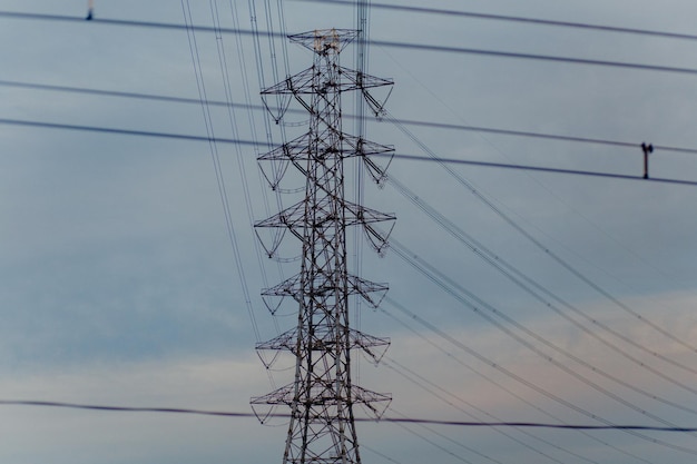 Low angle view of electricity pylon against sky