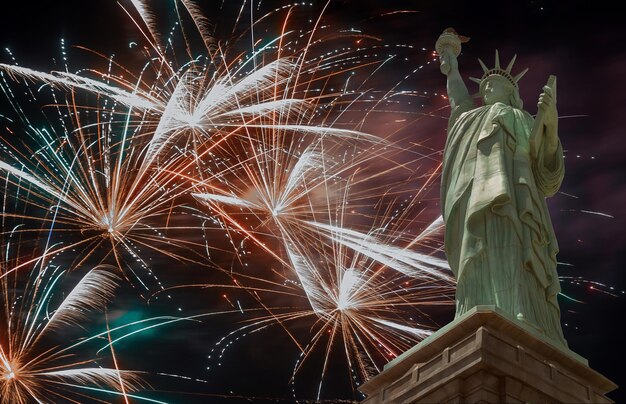 Low angle view of firework display at night