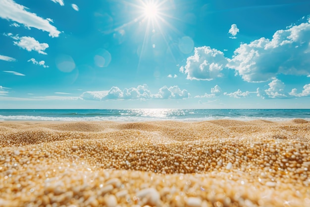 Photo low angle view of golden sand beach with blue sky and sun