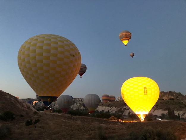 Low angle view of hot air balloons against sky