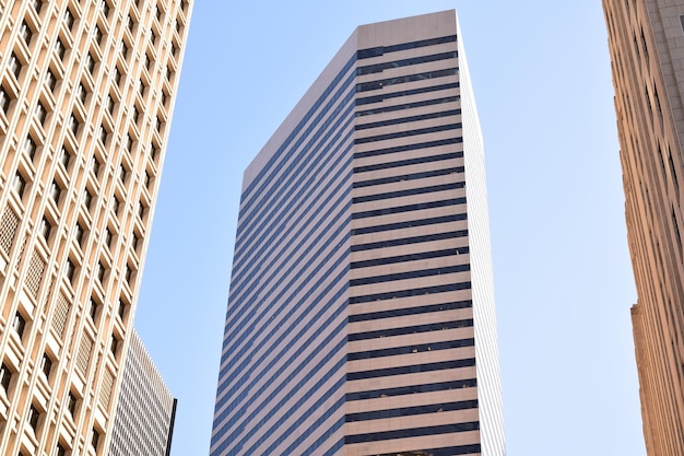 Photo low angle view of modern buildings against clear sky