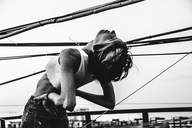 Low angle view of person against sky