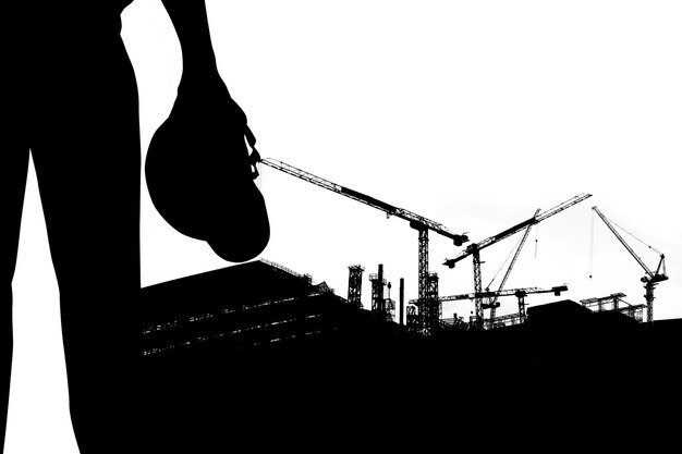 Photo low angle view of silhouette crane against clear sky