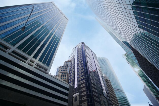 Low angle view of singapore city buildings