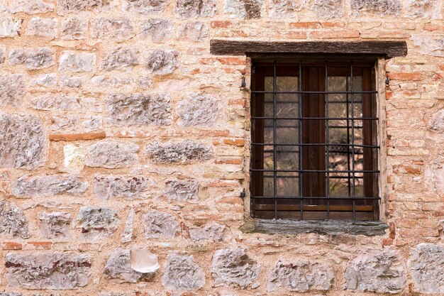 Low angle view of window on wall