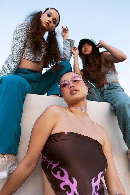 Low angle young women posing together