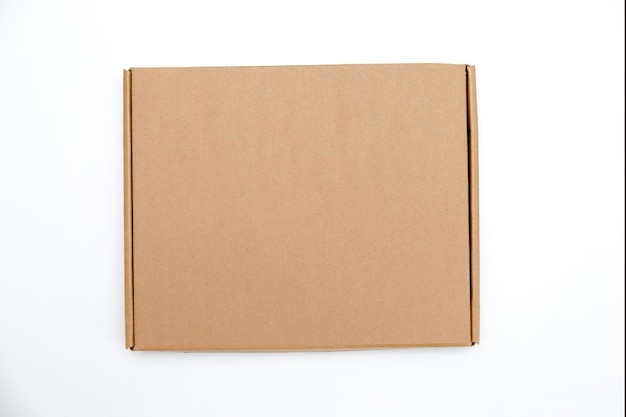 Low cardboard box with hinged lid isolated on white background template for design