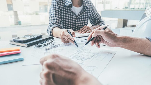 Photo low section of people working on table