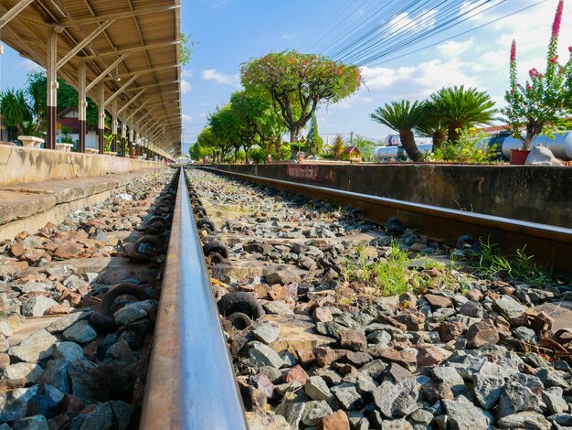 Low view railroad in the sunlight of the beautifulTrain station Lampang at Thailand