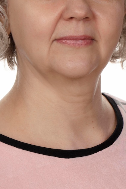 Photo the lower part of the face of an elderly woman after fifty with pronounced agerelated