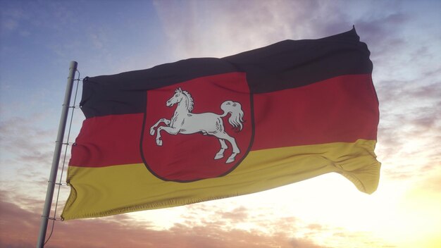 Lower Saxony flag Germany waving in the wind sky and sun background 3d rendering