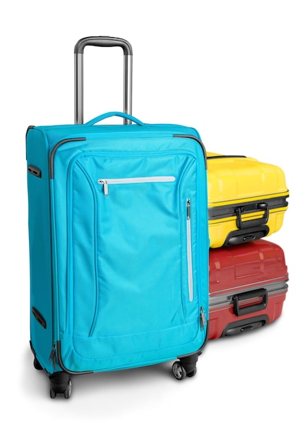 Luggage consisting of three polycarbonate suitcases isolated on white