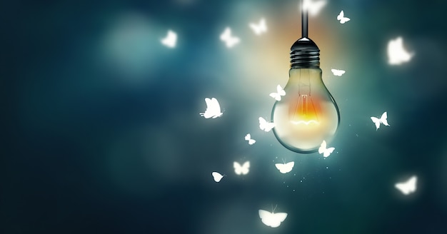 Luminous bulb and butterflies flying on light