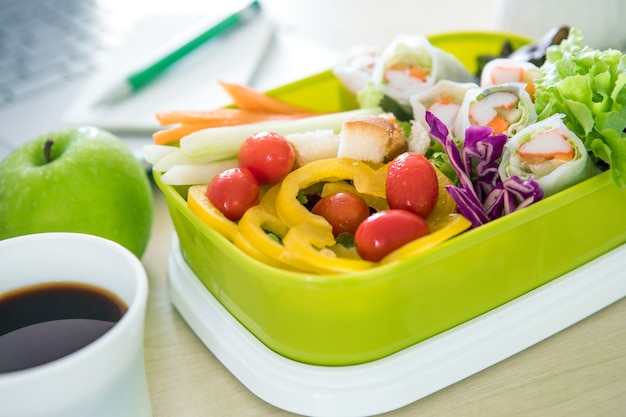 Lunch box on the work place of working desk