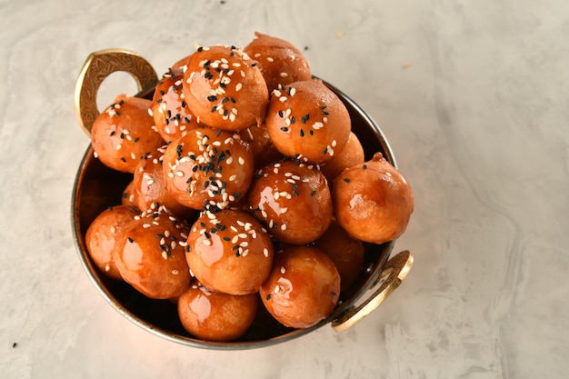 luqaimat or lokma. Freshly fried Lokma piled high a popular middle eastern dessert