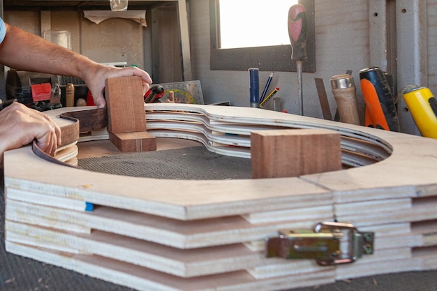 luthier craft workshop building a guitar