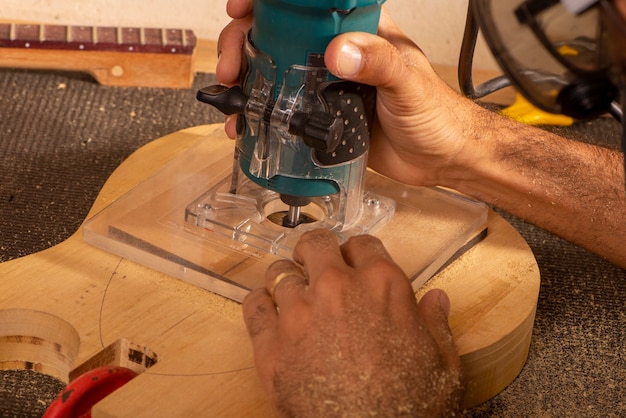 Luthier working in his workshop