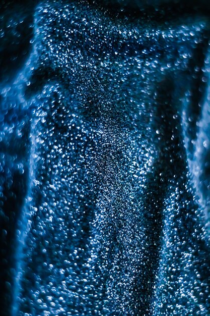 Photo luxe glowing texture night club branding and new years party concept  blue holiday sparkling glitter abstract background luxury shiny fabric material for glamour design and festive invitation