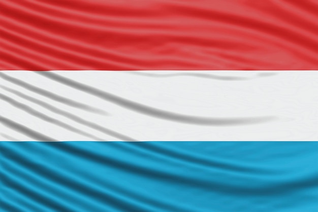 Photo luxembourg flag wave close up, national flag background