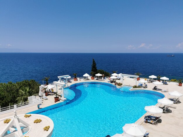 Luxurious pool with blue water and sea views Kusadasi Turkey