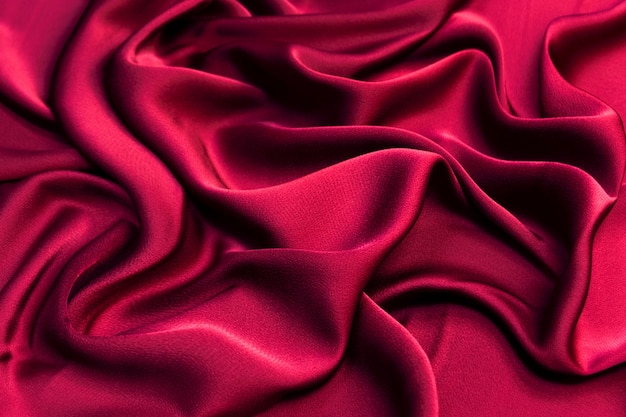 Luxurious satin fabric waves background