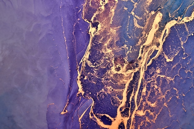 Luxury abstract background in alcohol ink technique, purple gold liquid painting, scattered acrylic blobs and swirling stains, printed materials