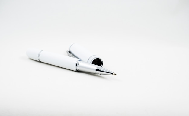 Photo luxury ball point pen on white background, business concept