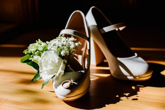 Luxury brides shoes, rings and wedding accessories