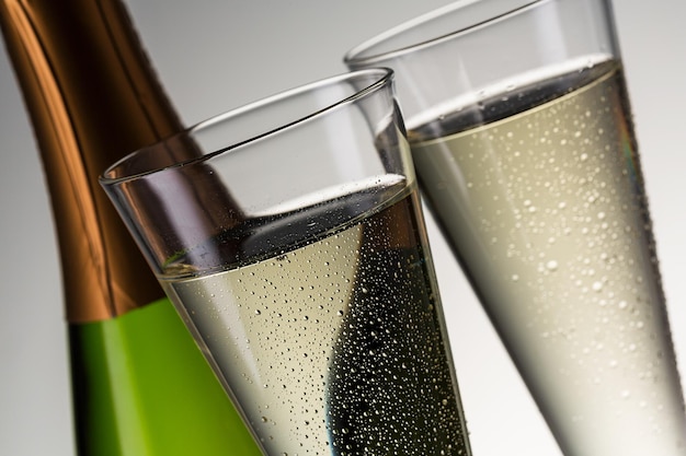 Luxury champagne with dewdrops and bottle