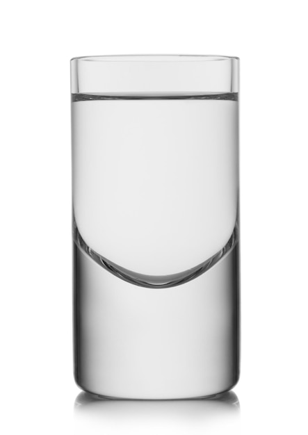 Luxury crystal shot glass of vodka and tequila on white