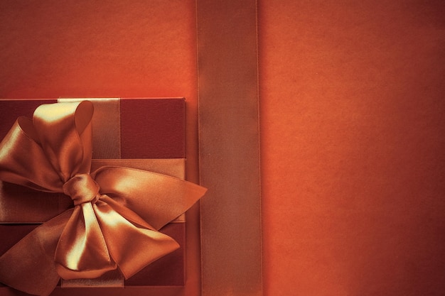 Luxury gifts with golden bow as holiday background Valentines Day presents surprise