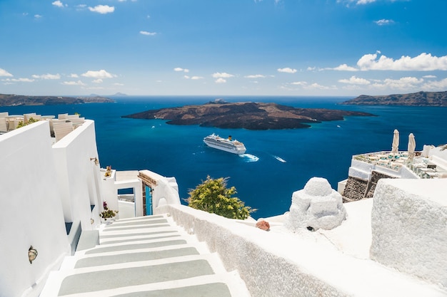 Luxury hotel with sea view. White architecture on Santorini island, Greece. Beautiful summer landscape