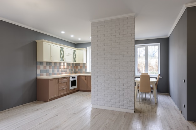 Luxury modern provence styled grey, pink and cream kitchen interior