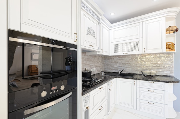 Luxury modern white colored kitchen interior