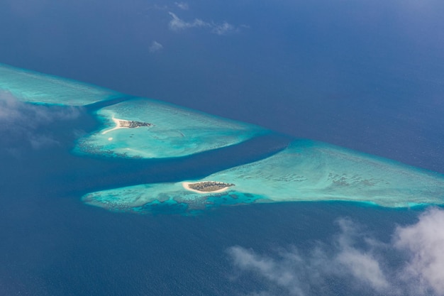 Luxury travel landscape Maldives aerial view tropical resort on paradise island sea atoll reef