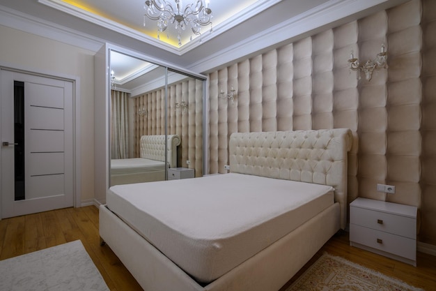 Luxury well designed modern beige master bedroom