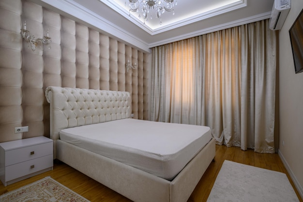 Luxury well designed modern beige master bedroom