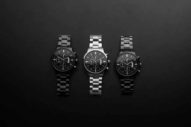 Luxury white chrome watch on black background