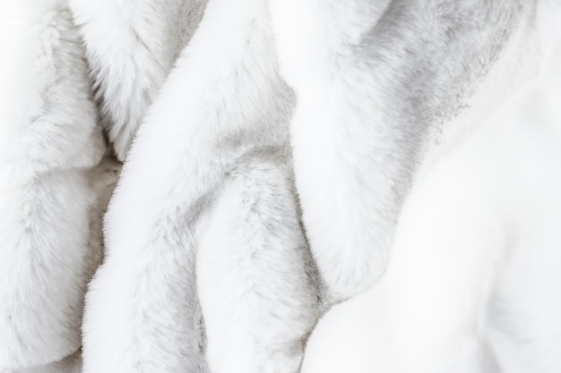 Luxury white fur coat texture background artificial fabric detail