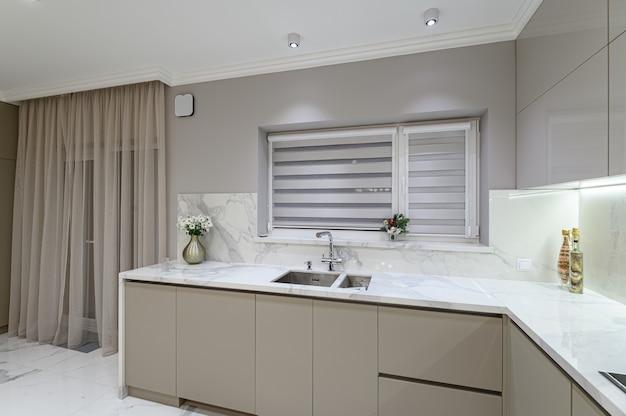 Luxury white modern marble kitchen in studio space