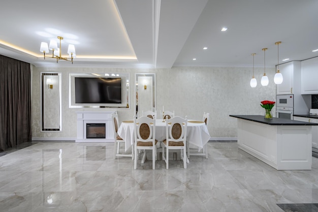 Luxury white spacious domestic kitchen with marble floor