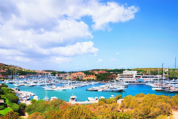 Luxury yachts at harbor of Porto Cervo resort, Costa Smeralda, Sardina in Italy.