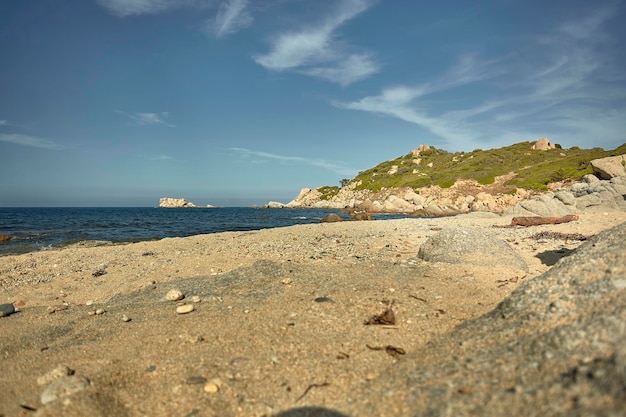 Lying on the ground in the Mediterranean beach