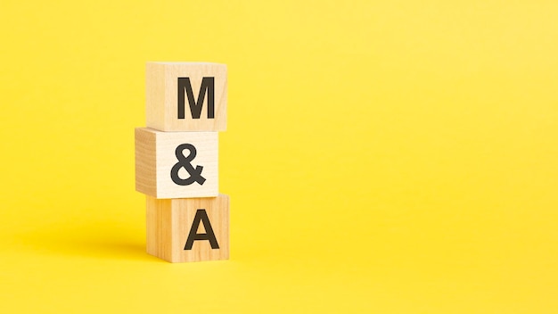 M and a symbol beautiful yellow background business concept copy space