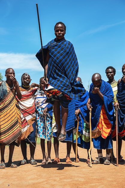 Maasai men perform the famous traditional dance of Kenya