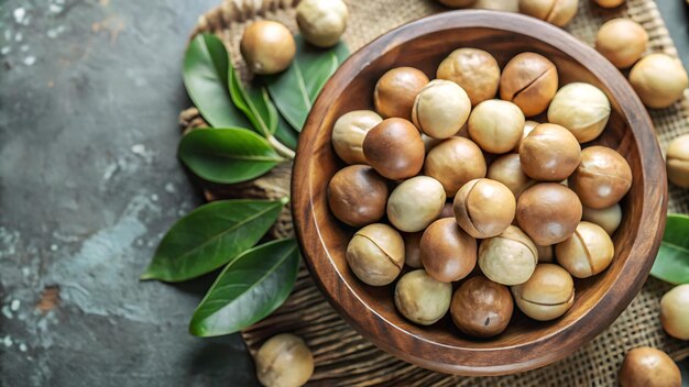 Photo macadamia nuts in wooden bowl healthy and delicious