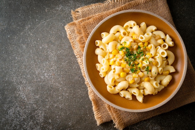 Macaroni creamy corn cheese on plate